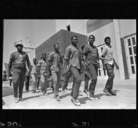 African American boys walk to summer jobs in Watts, Los Angeles (Calif.)