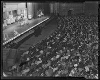 Jessie Marie DeBoth conducts cooking class to crowd of 3,500 homemakers, Los Angeles, 1938