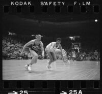 Lew Alcindor plays offense for UCLA basketball in game against USC