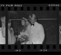 Norman Chandler and bride, the former Jane Emilie Yeager, after their marriage ceremony. A. 1976