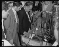 Dr. C.C. Warn observing Dr. Ralph Willard’s frozen monkey experiment, Los Angeles, 1935