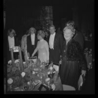 Otis Chandler (center) with wife Marilyn Brant (left) mother Dorothy Buffum Chandler and sons at the Las Madrinas Ball, 1973