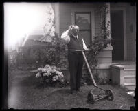 Governor of California, Friend W. Richardson mowing a lawn, California, 1922-1927