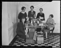 Mmes. Edwin Kraft, Donald Alexander, James Seeley, Arthur Kramer and Cecile B. Keeney with collected food for the needy, Los Angeles, 1935