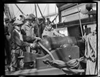 Three boys examine a cannon aboard the USF Constitution, San Pedro, 1933