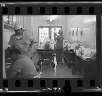 Patients laying on gurneys in corridor as they are prepped for abortion operations at Montclair Hospital, Calif., 1971