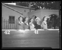 Police cadets Melva Myers, Betty Webster, Norma Johnston, Janet Elvedahl and Betty Hern posing with guns in Los Angeles, Calif., 1948