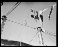 Hollywood Aero Club flag and others wave over the C. A. Larsen, Los Angeles, 1928