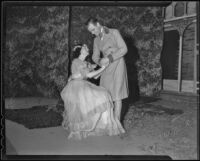 Actress Judith Alden and an unidentified actor at the Mason Theatre in downtown Los Angeles, 1936