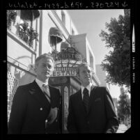 Kurt Niklas, owner and maitre d' Jimmy Murphy of the Bistro restaurant in Beverly Hills, Calif., 1972