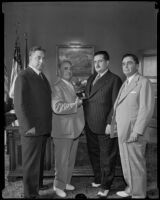 Police Chief Frank Davis, Mayor Frank Shaw, and Sheriff Gene Biscailuz welcome Mexican Governor Jose Mijares Palencia, Los Angeles, 1935