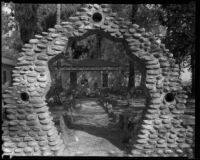 Hugo Reid Adobe, or Baldwin adobe, viewed through stone arch, Rancho Santa Anita, Arcadia, 1938