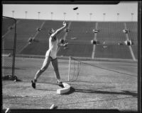 Stanford thrower putting a shot during the S.C. and Stanford dual track meet, Los Angeles, 1934