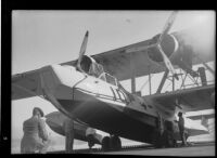 Four men attending the 10-P-4, a P2Y-1 Navy seaplane, San Francisco, 1934