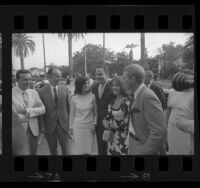 Luci Baines Johnson, Earl Warren Jr., Senator Birch Bayh, Natalie Wood and Steve McQueen arriving at party in Beverly Hills, Calif., 1964