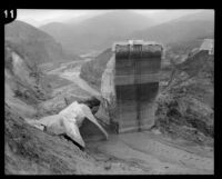 View of the remaining center portion of the St. Francis Dam visible after its disastrous collapse, San Francisquito Canyon (Calif.), 1928