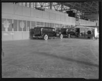 Two hearses for the bodies of Will Rogers and Wiley Post at Union Air Terminal, Burbank, 1935