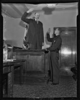 Tex Madsen is sworn in by J. A. Clapp, Los Angeles County, 1935