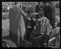 Bishop John J. Cantwell officiates at a graduation ceremony at Loyola University, Los Angeles, 1935