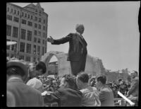 Crowd gathers to view contents of 1888 County Courthouse cornerstone, Los Angeles, 1936