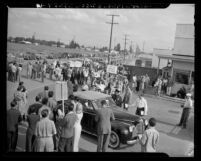 Artists on strike at Disney film studios parading near entrance in Los Angeles, Calif., 1941