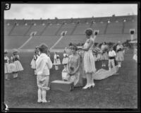 Allison Saunders is crowned May Day Queen at the Coliseum, Los Angeles, 1926