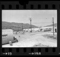 Cambodian refugees living in Quonset huts at Camp Pendleton, Calif., 1975