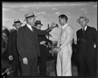 Assailant William Hardy and detective Joe Filkas retracing the scene of the crime, Los Angeles, 1935