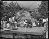 Chavez Ravine residents wave good-bye from truck