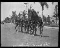 Men representing Native American Chumash people in the parade for the Old Spanish Days Fiesta, Santa Barbara, 1930