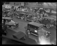 Stunt driver Hayward Thompson drives blindfolded through Los Angeles, 1927