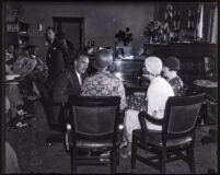 David H. Clark seated with relatives, Los Angeles, 1931