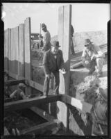 Engineers George M. Rowe and A.J. Barclay and other men at Union Station construction site, Los Angeles, 1935