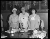 Mabel V. Socha, Agnes Fredericks, and Artie W. Burtnett standing at luncheon table, Los Angeles, 1933