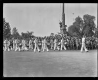 Drummers passing the Goodhue Flagpole at the start of the Tournament of Roses Parade, Pasadena, 1929