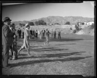 Macdonald Smith and another golfer on golf course, 1928