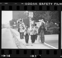 Striking McDonnell Douglas workers picketing plant in Long Beach, Calif., 1983