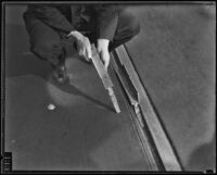 Metal rods intended to derail street cars, Los Angeles, 1934