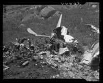 Tail section of C-46 rises above wreckage of Standard Airlines crash, 1949