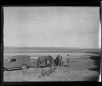 Ralph B Seeley, Frank Seebold, Mildred Fletcher, Ed Fletcher, Louise Whitney, and Stephen Fletcher take a break to enjoy the costal view, Gulf of California, Mexico, 1935