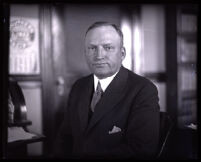 Asa Keyes at a Southern Pacific train station, Los Angeles, 1922-1929