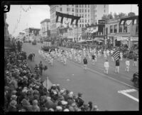 Elks Lodge marching band and "Uncle Sam Hat" float in the Tournament of Roses Parade, Pasadena, 1928