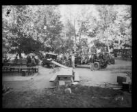 Disaster recovery workers seated on a pickup truck after the failure of the Saint Francis Dam and resulting flood, Santa Clara River Valley (Calif.), 1928