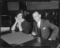 Arson suspect Robert D. Barr in court with defense witness Mary Lantz, Los Angeles, 1934