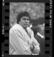 Jim Plunkett on the sidelines during Los Angeles Raiders game, 1984