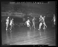 Andy Wolfe and Guy Buccola during UC vs UCLA basketball game, 1948