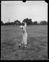 Jane Douglas, golfer, showing her follow-through, Los Angeles, 1933