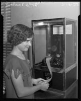 Marjorie Hunter receives output from a new seismograph at Griffith ...