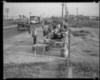 Officials order destruction of Hooverville, Los Angeles, circa 1940