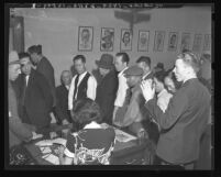 Suspects picked up in Chinatown Lottery raids by Los Angeles District Attorney's Office in 1938